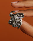 Courage is found in unlikely places enamel pin