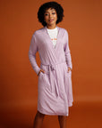 Close up woman in lilac cardigan