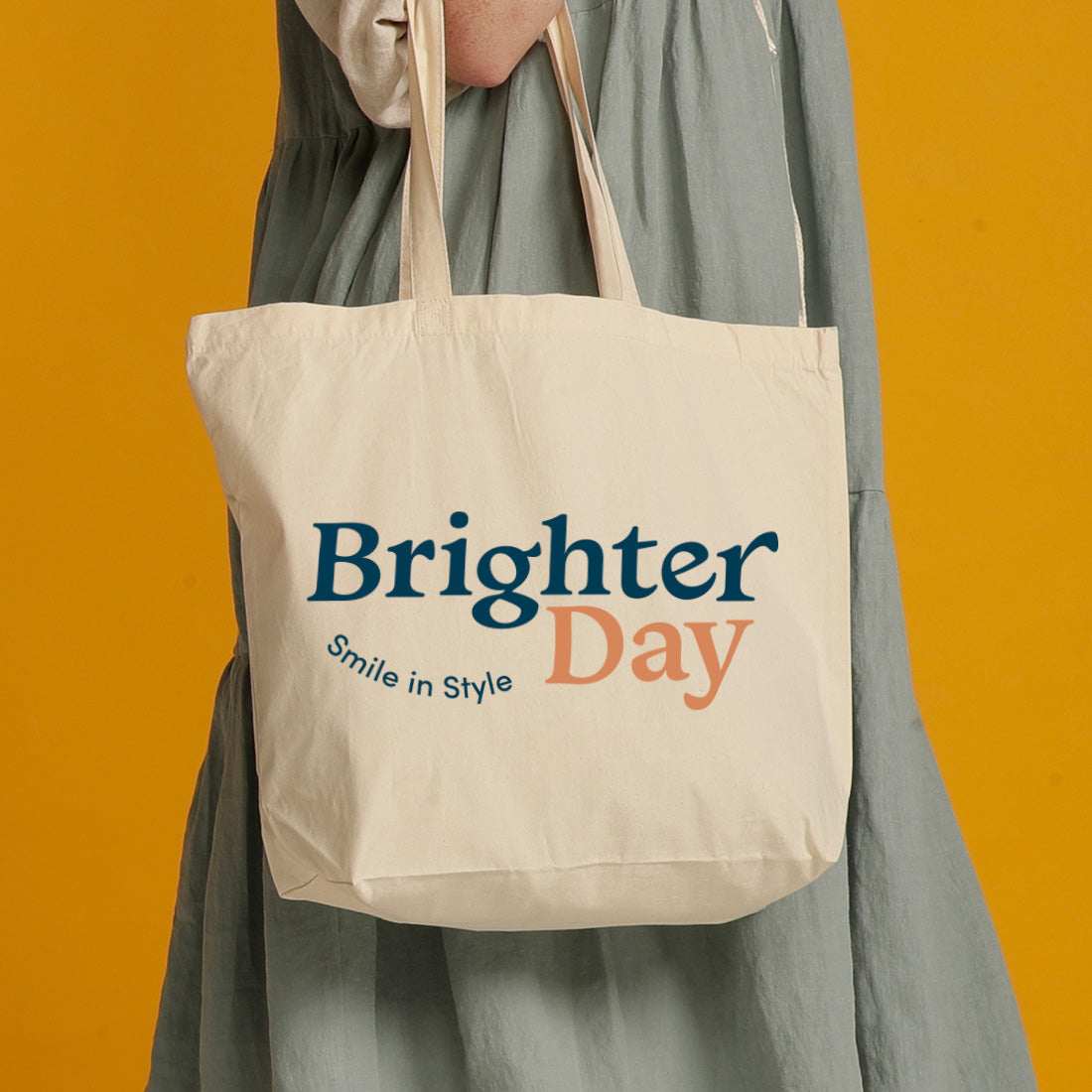 Close up natural tote bag with Brighter Day Smile in Style design