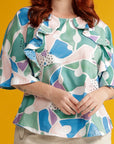 Close up plus sized woman in printed adaptive t shirt for chest port access