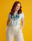 Red haired woman wears blue LOVE YOU Tee