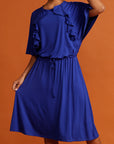 Close up royal blue dress with ruffle detail