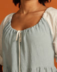 Close up sage dress drawstring adaptive neckline