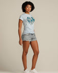 Curly haired woman wears Blue fitted LOVE YOU tee