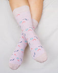 Close up of woman wearing pink socks with confetti pattern
