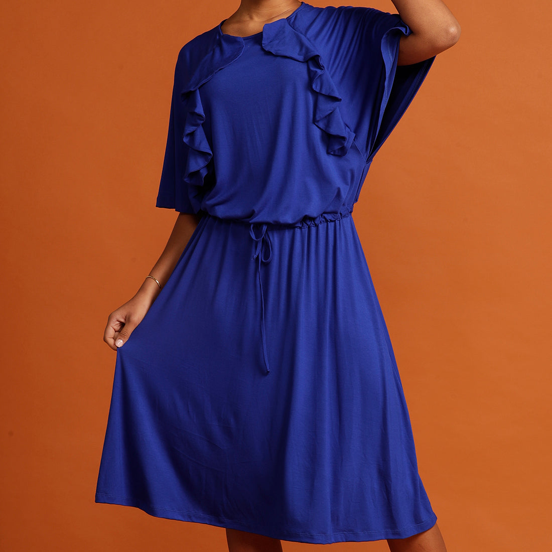 Close up royal blue dress with ruffle detail