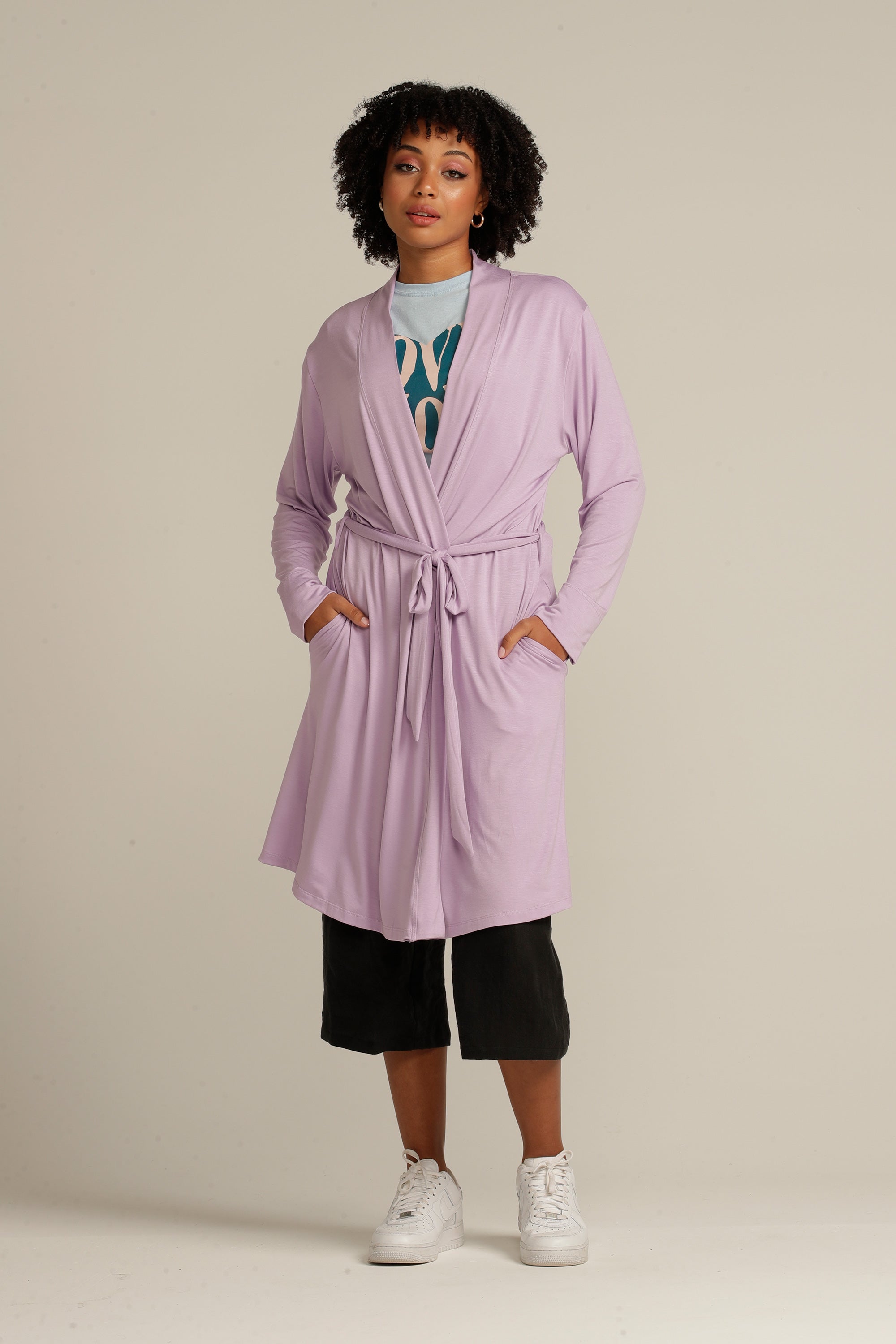 Front view woman in lilac cardigan